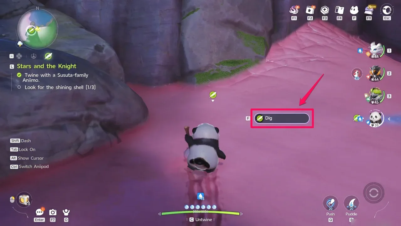Twined with a Susuta on the pink beach, with the Dig prompt and the Look for the shining shell objective on screen